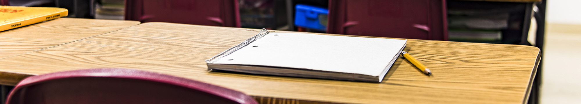 closeup of notebook sitting on a desk